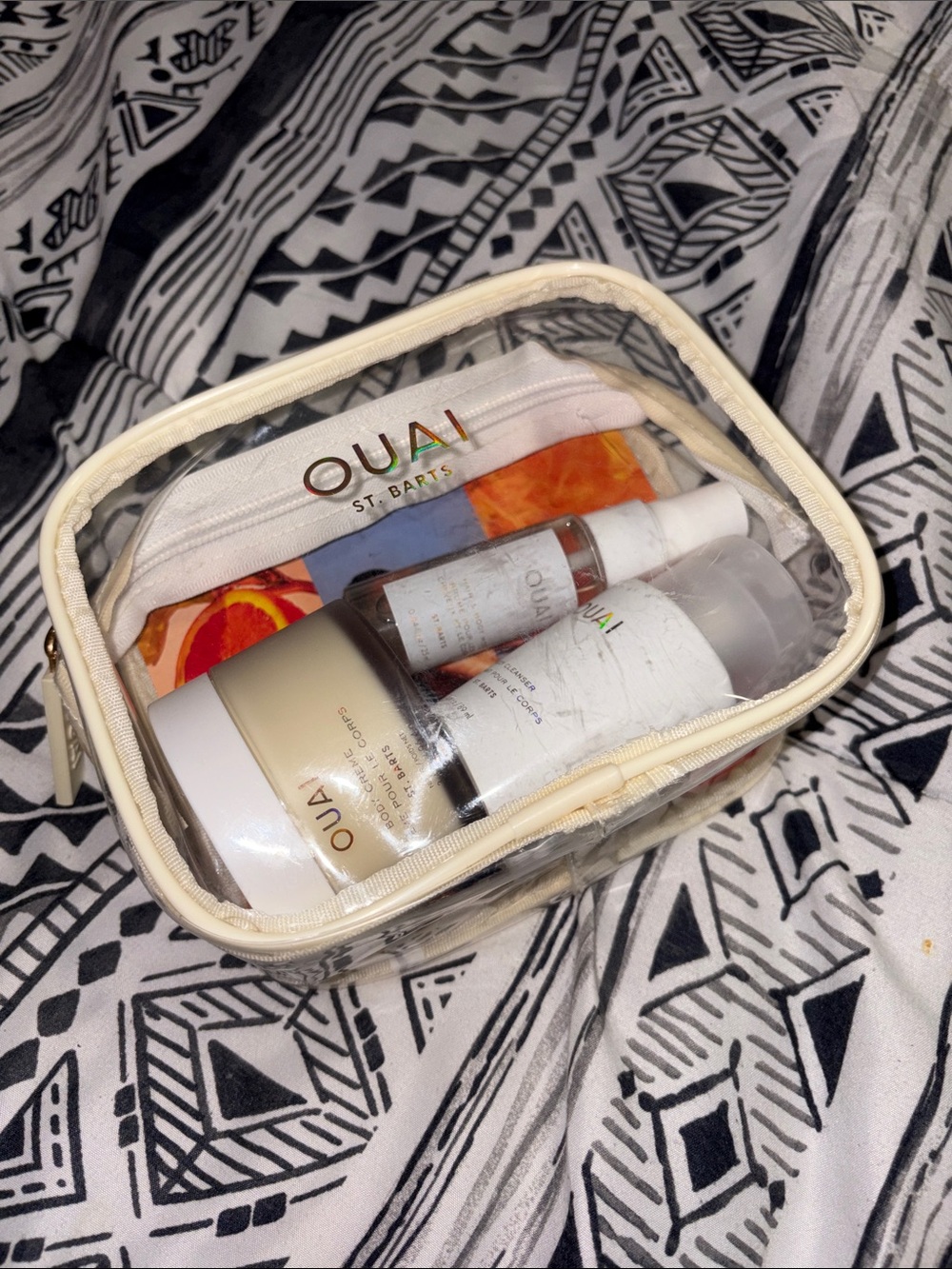 OUAI Clear Travel Cosmetic Pouch with Cream Trim and Branded Bottles